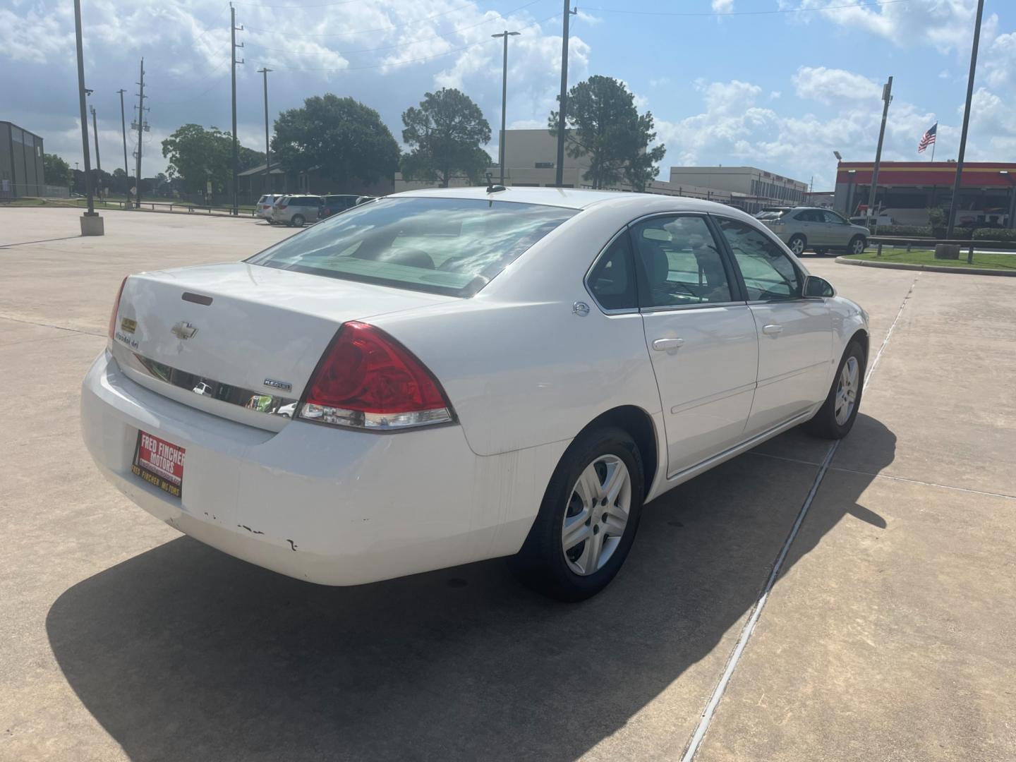 2007 white /gray Chevrolet Impala LS (2G1WB58K179) with an 3.5L V6 OHV 16V FFV engine, 4-Speed Automatic Overdrive transmission, located at 14700 Tomball Parkway 249, Houston, TX, 77086, (281) 444-2200, 29.928619, -95.504074 - Photo#6